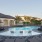 a swimming pool in front of a building