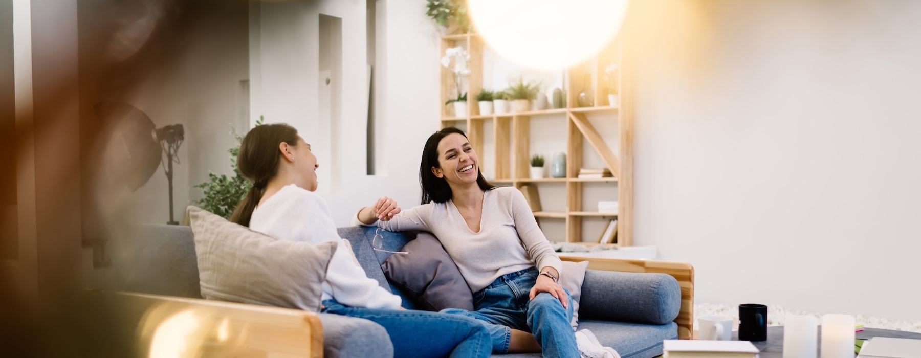 friends chatting on a sofa
