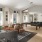 a living room with a piano and couches