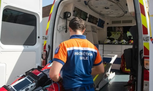 Public Safety & Emergency Services a paramedic at work in an abulance